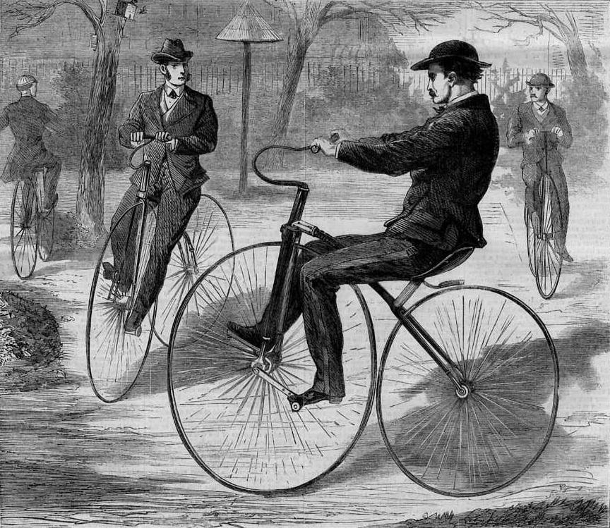 Two men on velocipedes
