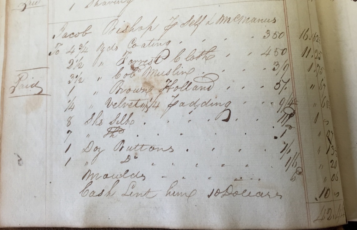 Photo of A page from a Carlisle merchant’s Day Book shows the materials that McManus bought to make clothing for Jacob Bishop and charged to Bishop’s account.
