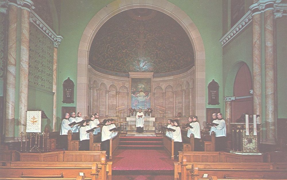 Image of the interior of First Evangelical Lutheran Church, Carlisle, PA , sanctuary, with choir and minister.